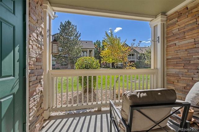 balcony featuring a porch