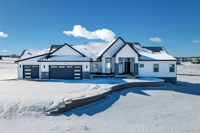 modern farmhouse with a garage