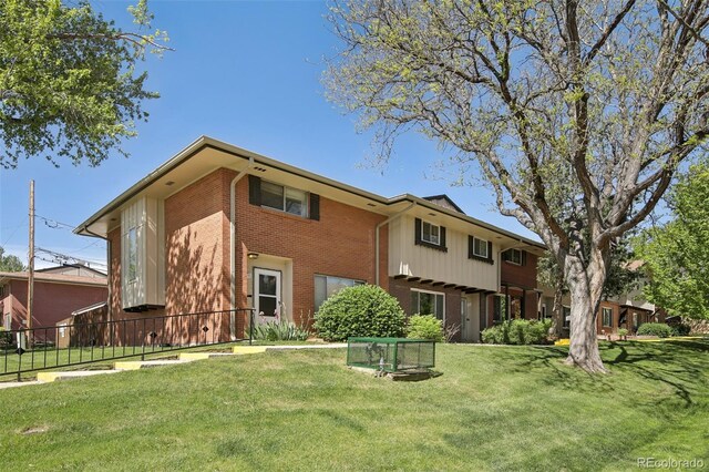 12455 W Alameda Dr, Lakewood, CO 80228 - back of house with brick siding