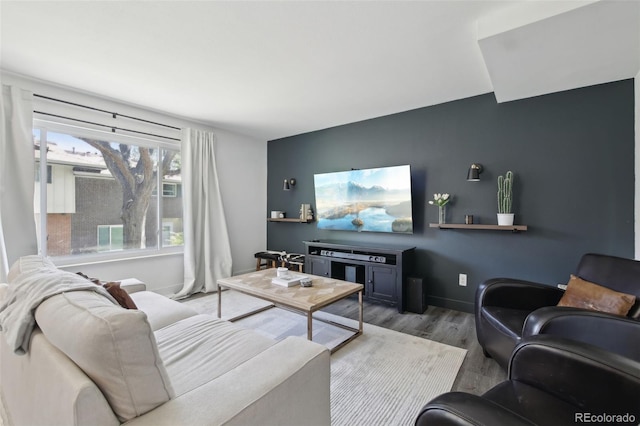 12455 W Alameda Dr, Lakewood, CO 80228 - living room featuring light wood finished floors and baseboards