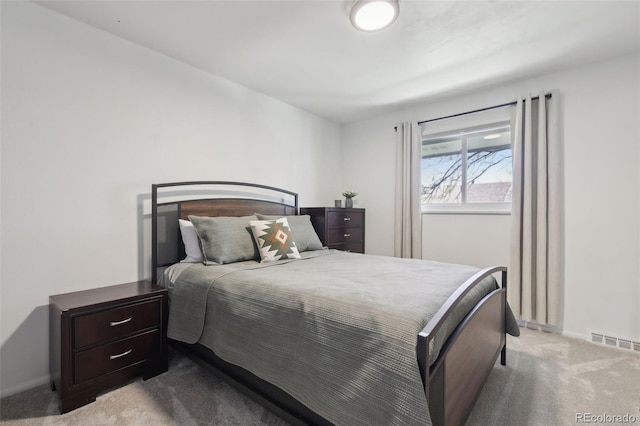12455 W Alameda Dr, Lakewood, CO 80228 - bedroom with light colored carpet and baseboards