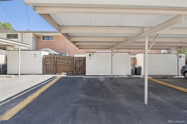 12455 W Alameda Dr, Lakewood, CO 80228 - garage with fence and covered parking