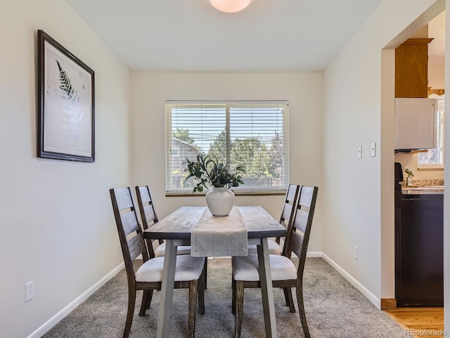 dining area featuring hardwood / wood-style flooring