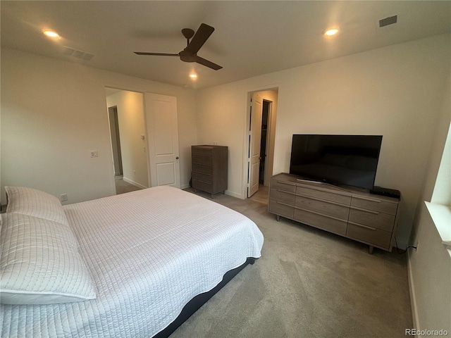 carpeted bedroom with ceiling fan