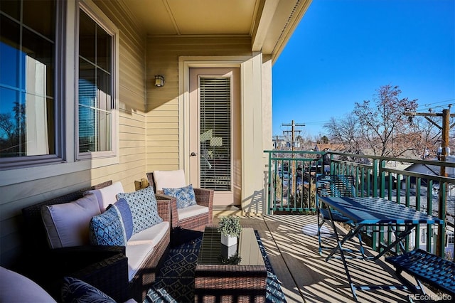 balcony with an outdoor hangout area