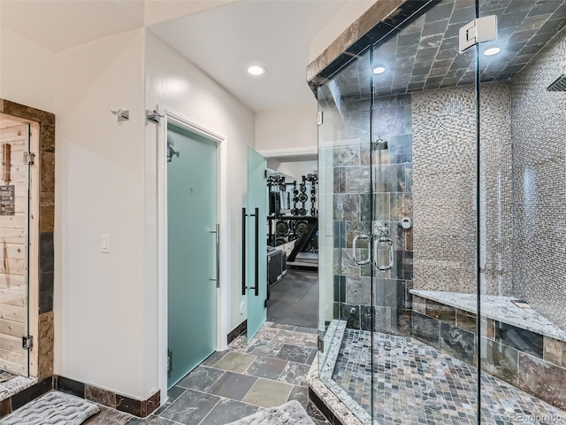 bathroom featuring an enclosed shower