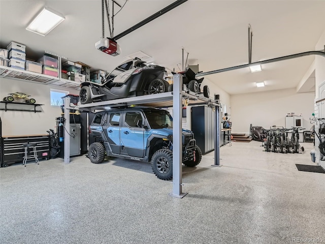 garage featuring a garage door opener