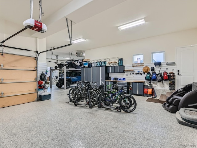 garage featuring a garage door opener