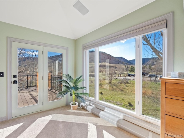 4825 6th St, Boulder, CO 80304 - sunroom featuring a mountain view, carpet, vaulted ceiling, and french doors