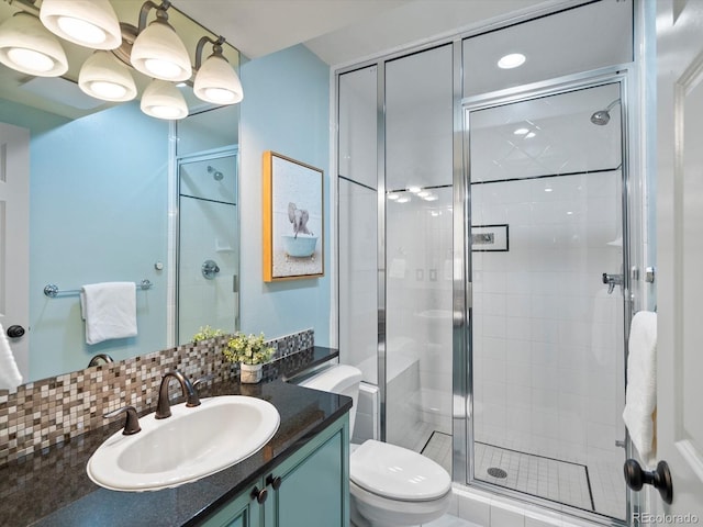 4825 6th St, Boulder, CO 80304 - bathroom featuring vanity, a shower stall, and tasteful backsplash