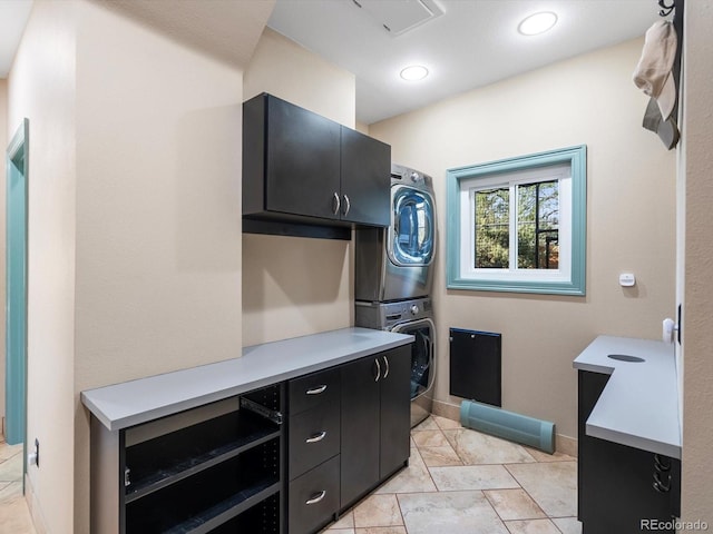 4825 6th St, Boulder, CO 80304 - laundry room with cabinet space and stacked washer / dryer