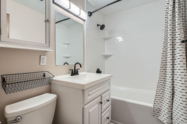 full bathroom featuring shower / bath combo, vanity, and toilet