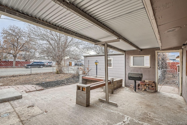 view of patio featuring fence