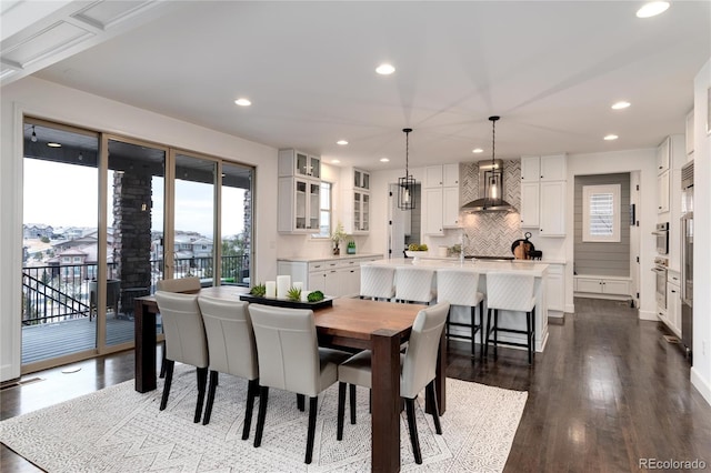 dining room with dark hardwood / wood-style floors