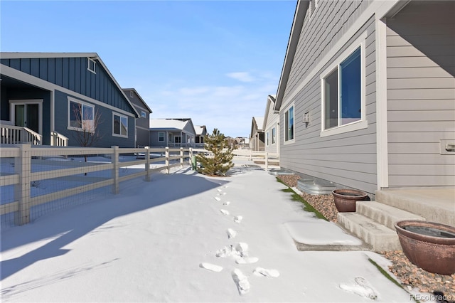 view of yard covered in snow