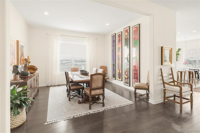 dining area featuring recessed lighting, baseboards, and dark wood finished floors