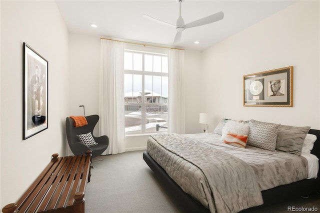 bedroom featuring multiple windows, carpet, and recessed lighting