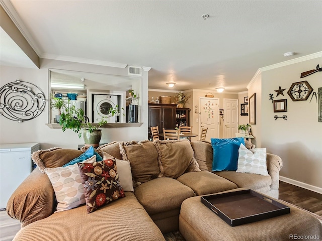 living room featuring ornamental molding, ceiling fan, and hardwood / wood-style floors