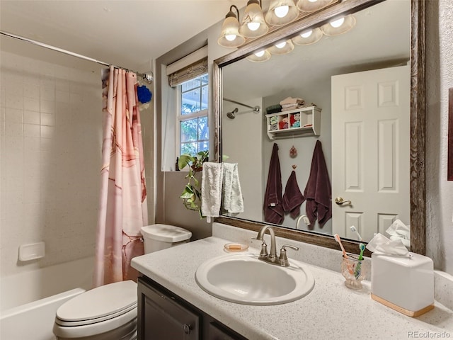 full bathroom featuring shower / bath combination with curtain, vanity, and toilet