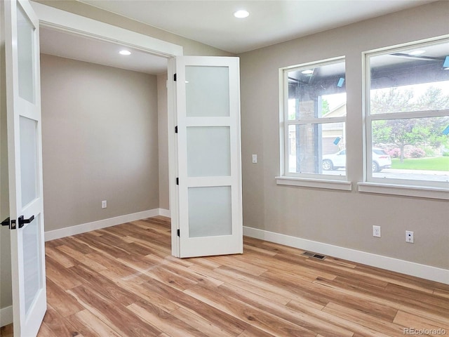5550 Wetlands Dr, Longmont, CO 80504 - spare room with light wood-type flooring, healthy amount of natural light, and recessed lighting