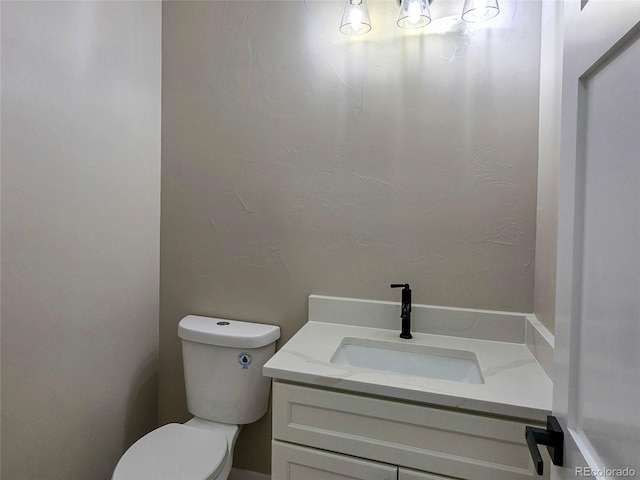 5550 Wetlands Dr, Longmont, CO 80504 - bathroom featuring toilet and vanity