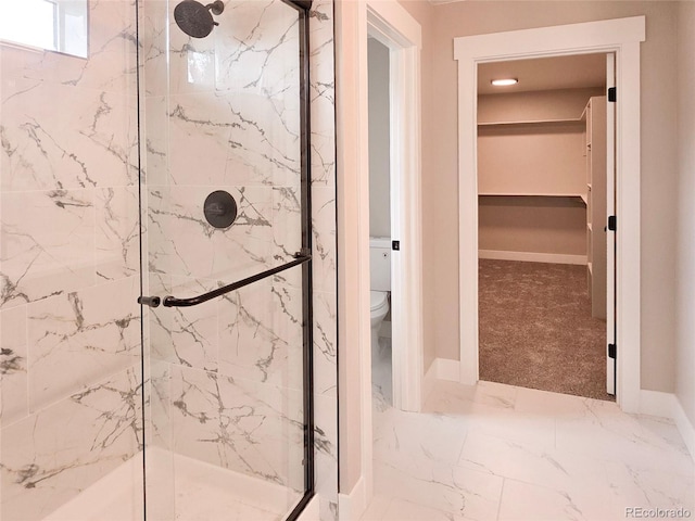 5550 Wetlands Dr, Longmont, CO 80504 - full bathroom featuring a marble finish shower and marble finish floors