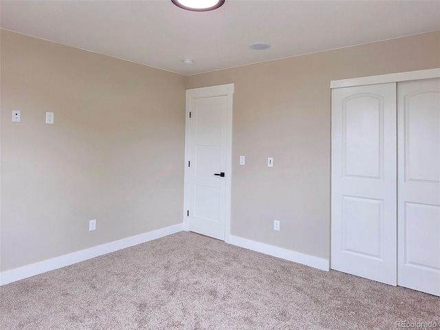 5550 Wetlands Dr, Longmont, CO 80504 - unfurnished bedroom featuring carpet flooring and a closet