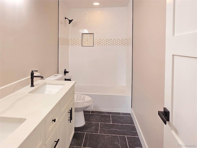 5550 Wetlands Dr, Longmont, CO 80504 - bathroom featuring marble look tile flooring, double vanity, and  shower combination