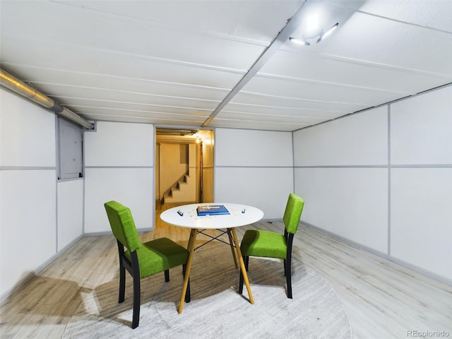 dining space with light hardwood / wood-style flooring