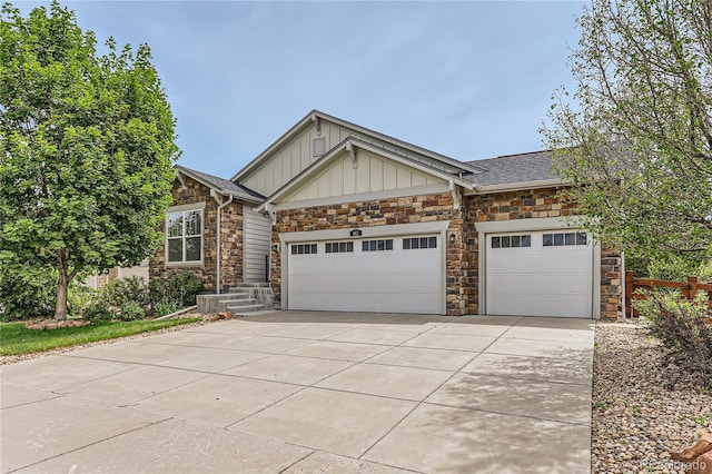 craftsman inspired home featuring a garage, board and batten siding, and concrete driveway