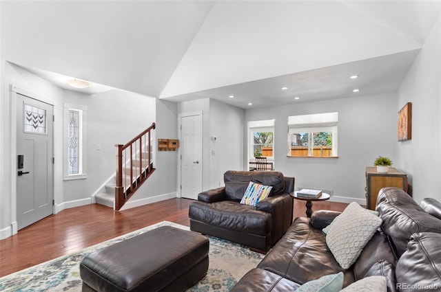 16841 E Hialeah Ave, Centennial, CO 80015 - living area with stairs, wood finished floors, recessed lighting, and high vaulted ceiling