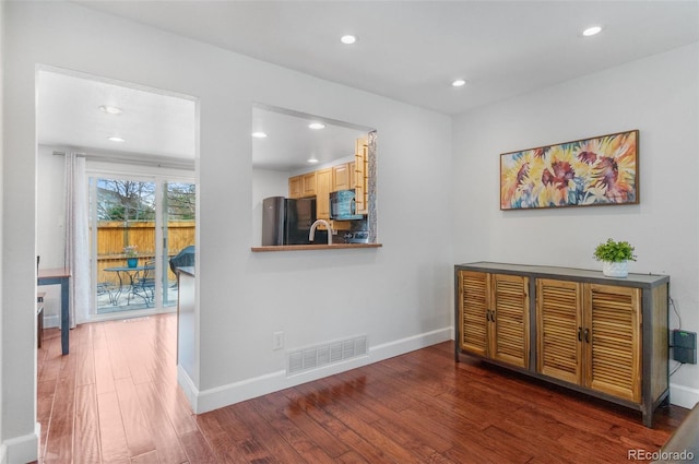 16841 E Hialeah Ave, Centennial, CO 80015 - hallway featuring wood finished floors and recessed lighting