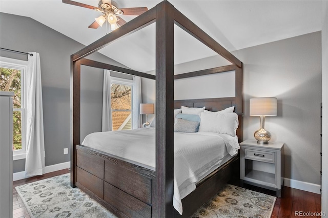 16841 E Hialeah Ave, Centennial, CO 80015 - bedroom with lofted ceiling, multiple windows, wood finished floors, and a ceiling fan