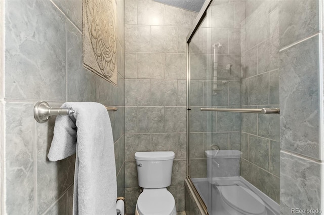 16841 E Hialeah Ave, Centennial, CO 80015 - bathroom with shower / bath combination and tile walls