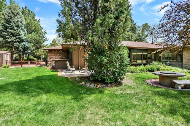 4790 W Lakeridge Rd, Denver, CO 80219 - view of yard featuring a patio area