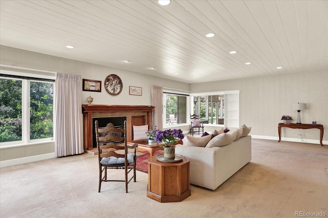 4790 W Lakeridge Rd, Denver, CO 80219 - living area with light colored carpet, recessed lighting, a fireplace with raised hearth, wooden ceiling, and baseboards