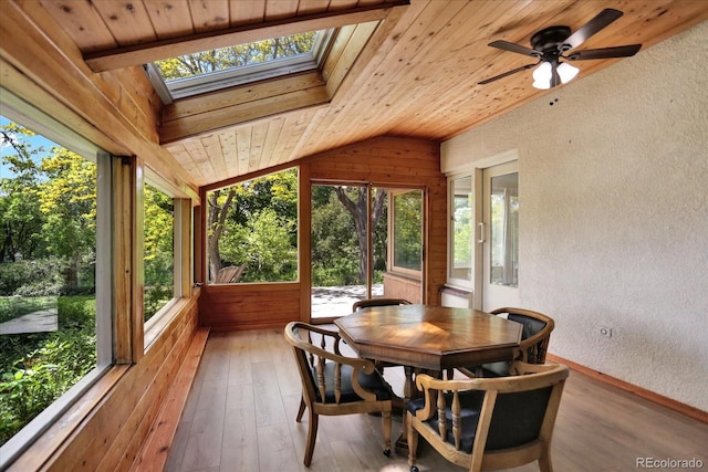 4790 W Lakeridge Rd, Denver, CO 80219 - sunroom / solarium with a textured wall, lofted ceiling, wood ceiling, a skylight, and hardwood / wood-style floors