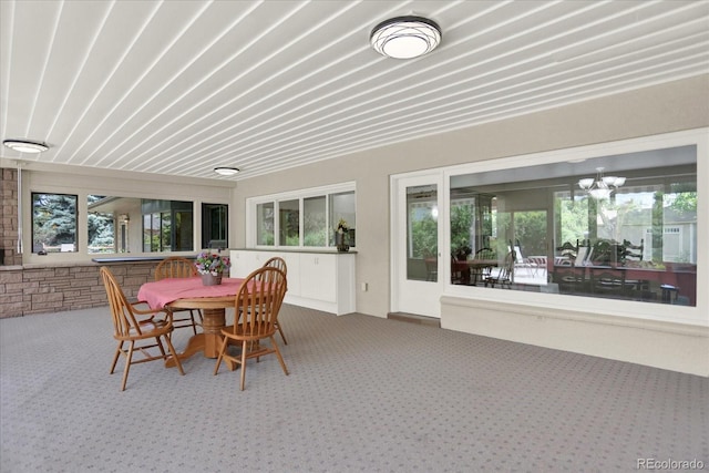 4790 W Lakeridge Rd, Denver, CO 80219 - sunroom with a chandelier