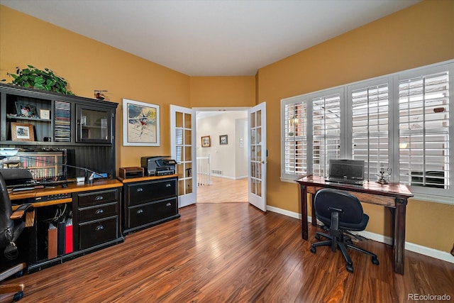 office area featuring dark hardwood / wood-style flooring and french doors