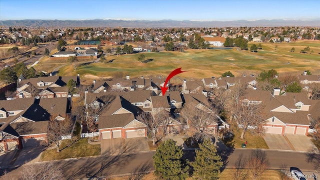 birds eye view of property featuring a mountain view