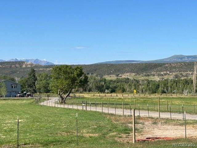 view of mountain feature featuring a rural view