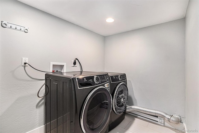 washroom with washer and clothes dryer