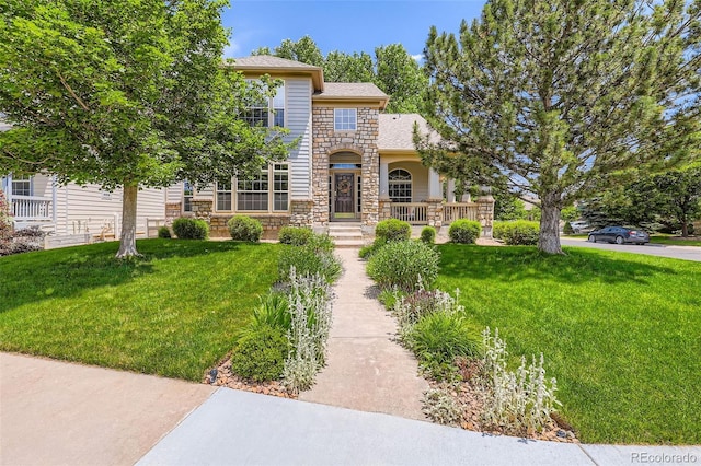 11638 Xavier Way, Westminster, CO 80031 - view of front of house with stone siding and a front yard