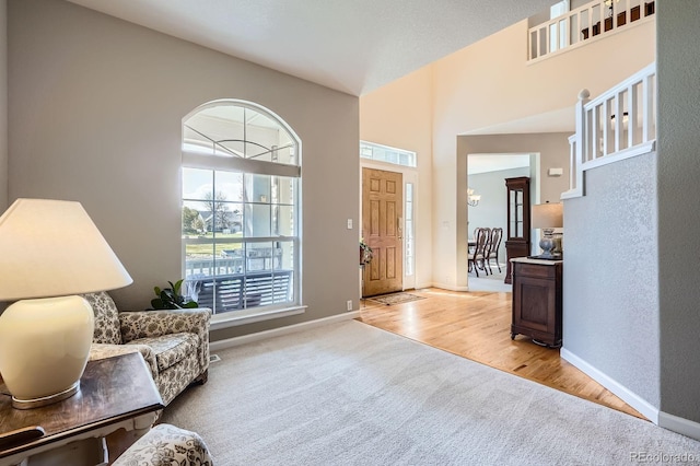 11638 Xavier Way, Westminster, CO 80031 - entrance foyer with light carpet and a towering ceiling