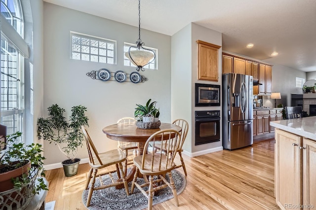 11638 Xavier Way, Westminster, CO 80031 - dining space featuring light wood-style flooring and recessed lighting
