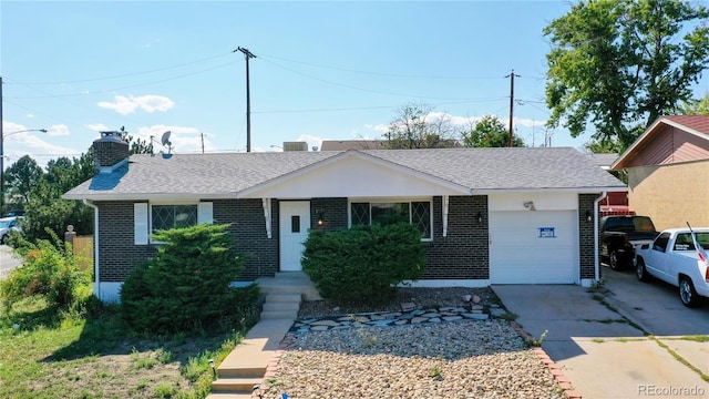 ranch-style home featuring a garage