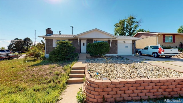 ranch-style house featuring a garage