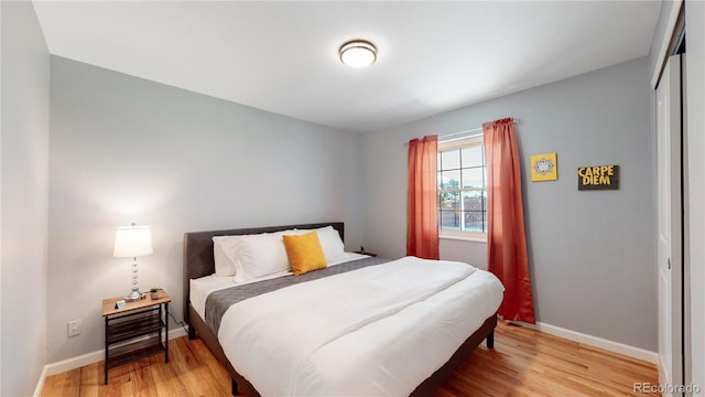 7609 Sherman Pl, Denver, CO 80221 - bedroom with a closet and light hardwood / wood-style flooring