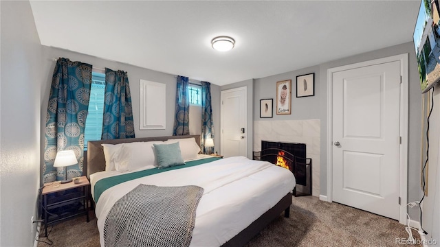7609 Sherman Pl, Denver, CO 80221 - carpeted bedroom with a fireplace