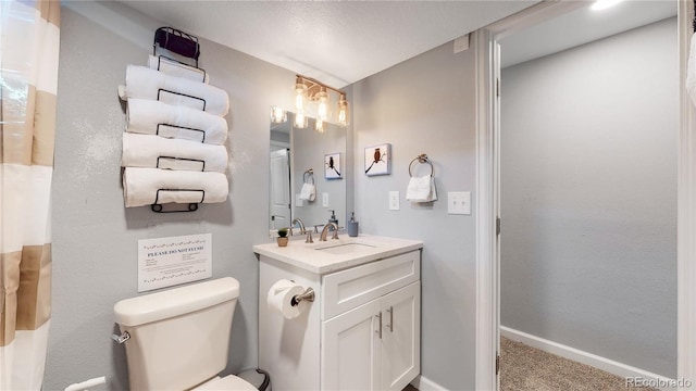 7609 Sherman Pl, Denver, CO 80221 - bathroom with vanity and toilet